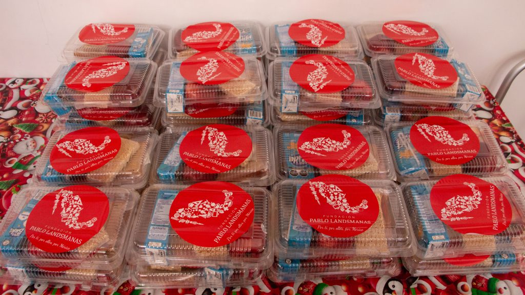 distribución de alimentos de programa alimentario de La Cosmopolitana para comunidades vulnerables